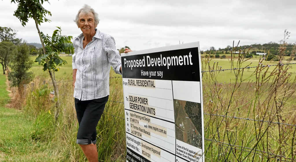 RAISED VOICES: Joan Featherstone is one of many neighbouring residents who are against the development of this land for solar power generation units. RAISED VOICES: Joan Featherstone is one of many neighbouring residents who are against the development of this land for solar power generation units.